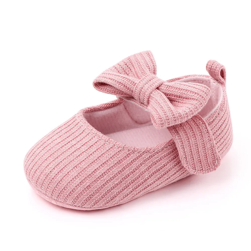 Bowknot woolen knit baby shoes in moccasin style with Velcro fastening, available in pink