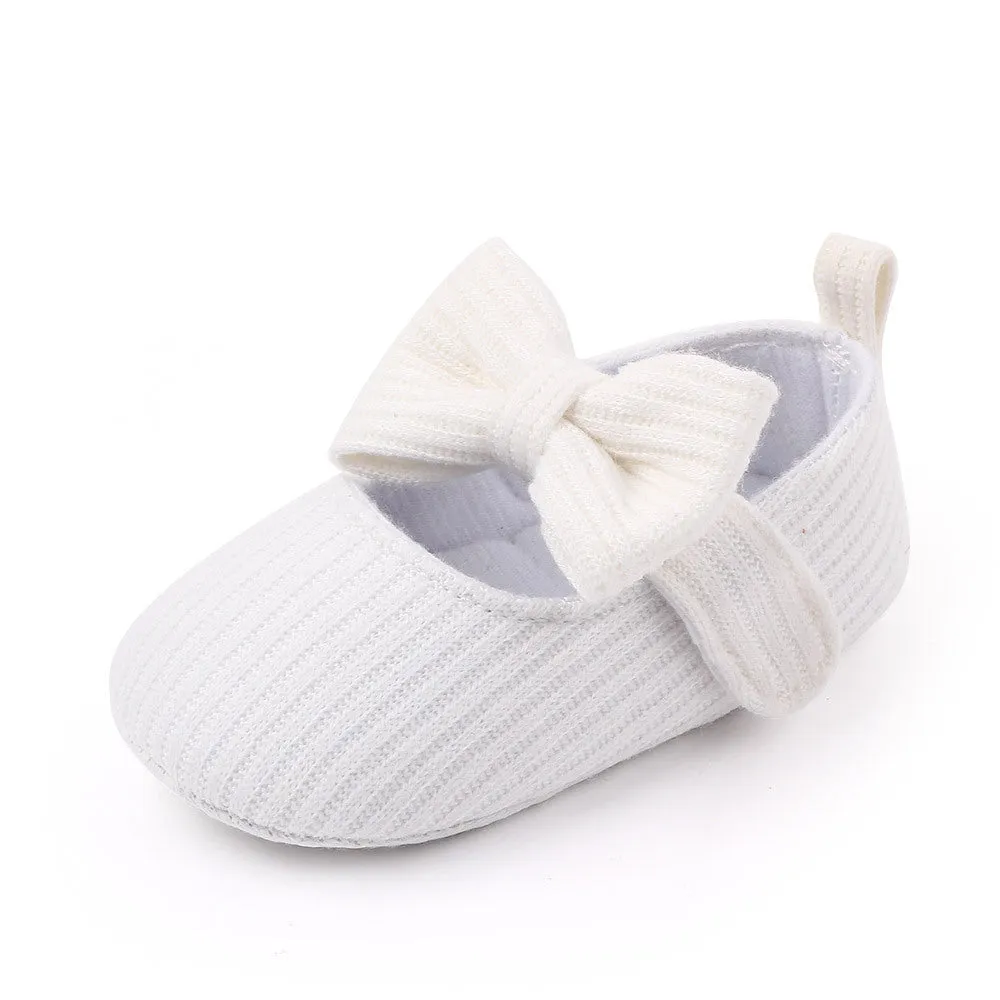 Bowknot woolen knit baby shoes in moccasin style with Velcro fastening, available in pink