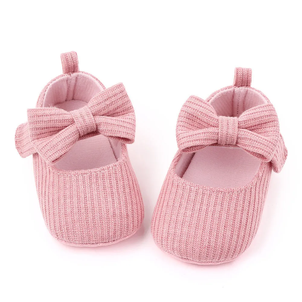 Bowknot woolen knit baby shoes in moccasin style with Velcro fastening, available in pink