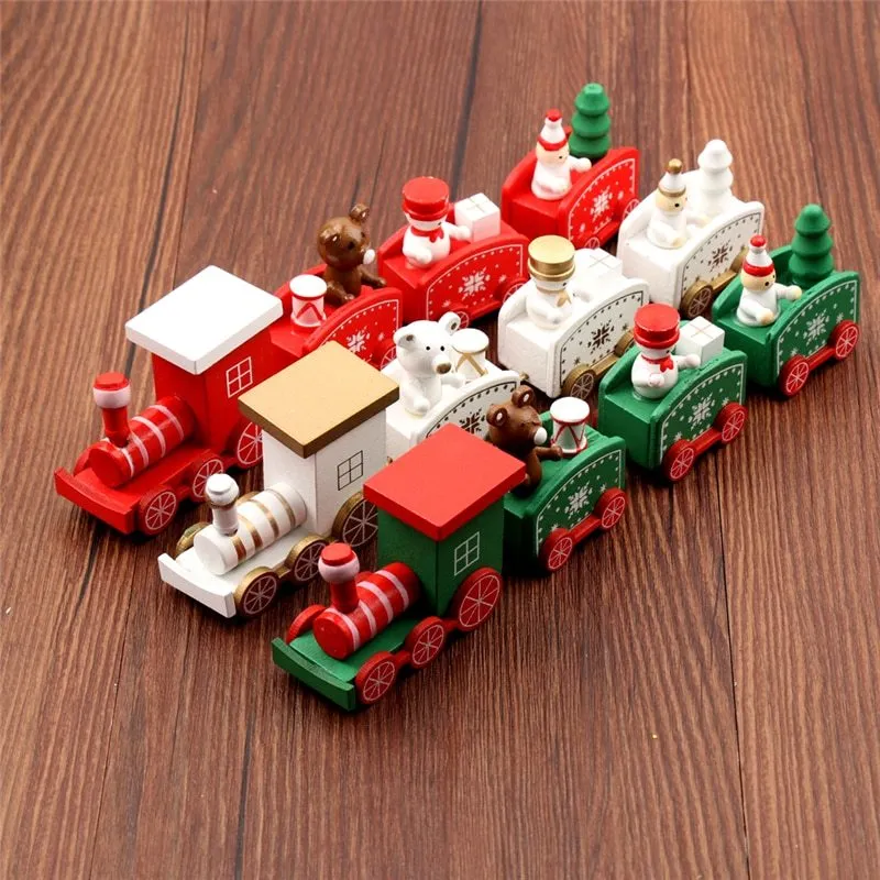 Set of four mini wood train toys in red white and green with painted passengers for shelf display