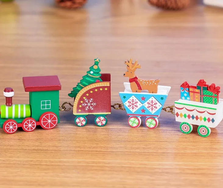 Set of four mini wood train toys in red white and green with painted passengers for shelf display