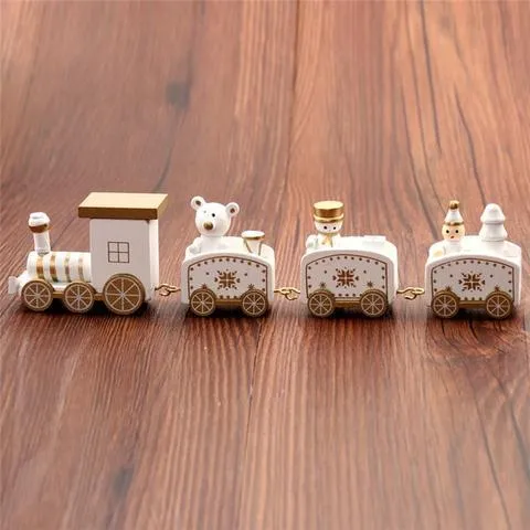Set of four mini wood train toys in red white and green with painted passengers for shelf display