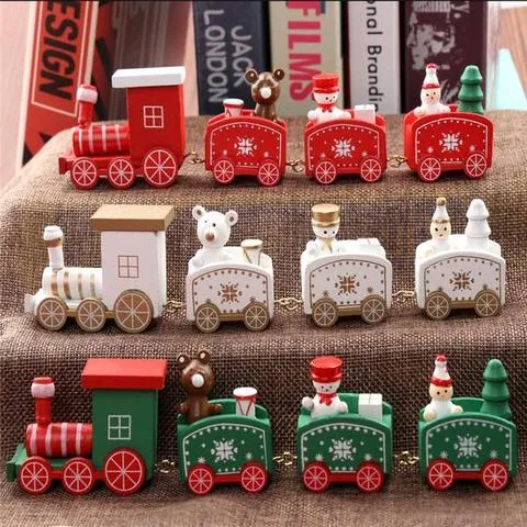 Set of four mini wood train toys in red white and green with painted passengers for shelf display