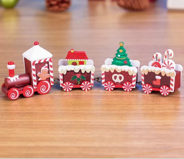 Set of four mini wood train toys in red white and green with painted passengers for shelf display