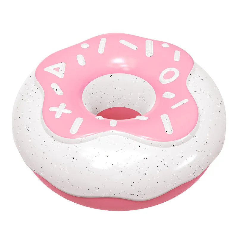 Pink donut-shaped dog toy with textured surface for teeth cleaning
