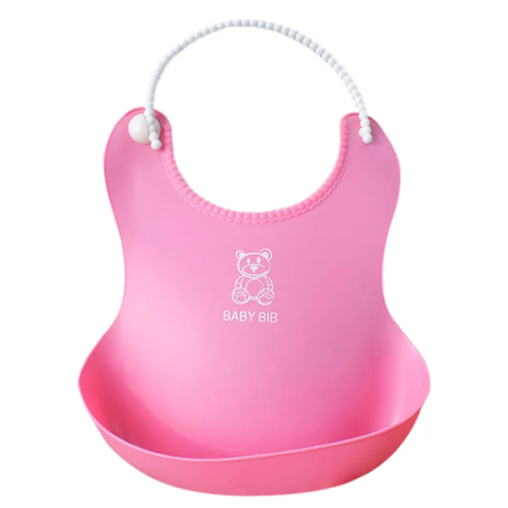 Baby soft silicone bib in pink with cartoon pattern, adjustable closure, 27x21cm