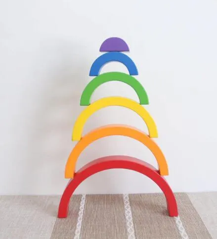 12-piece wooden building blocks in rainbow and arch shapes, New Zealand pine with light lacquer finish