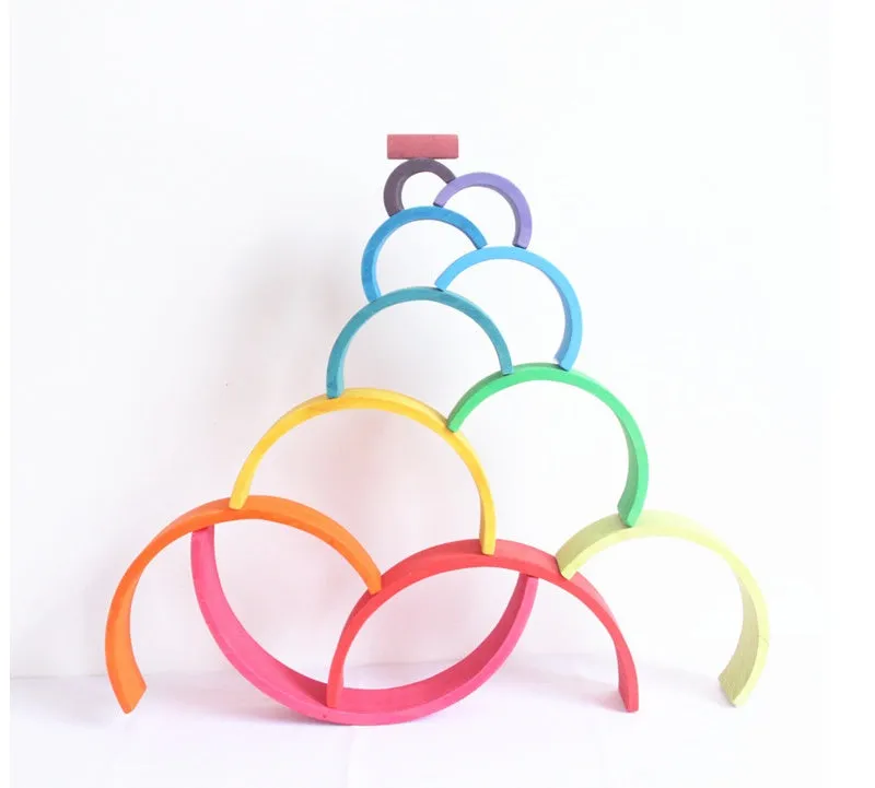 12-piece wooden building blocks in rainbow and arch shapes, New Zealand pine with light lacquer finish