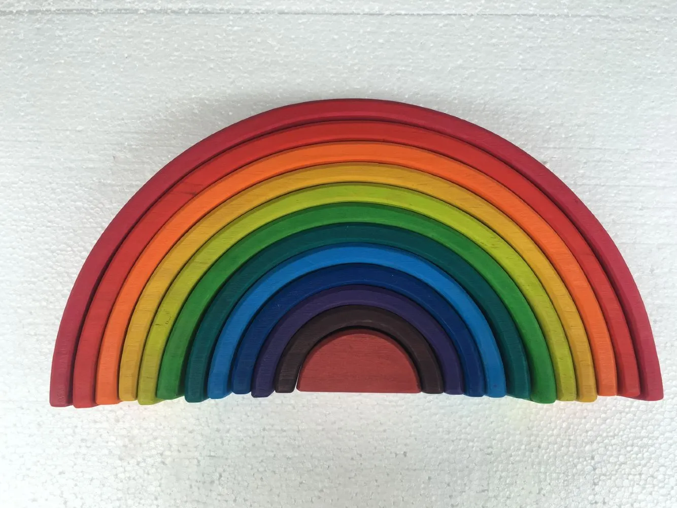 12-piece wooden building blocks in rainbow and arch shapes, New Zealand pine with light lacquer finish
