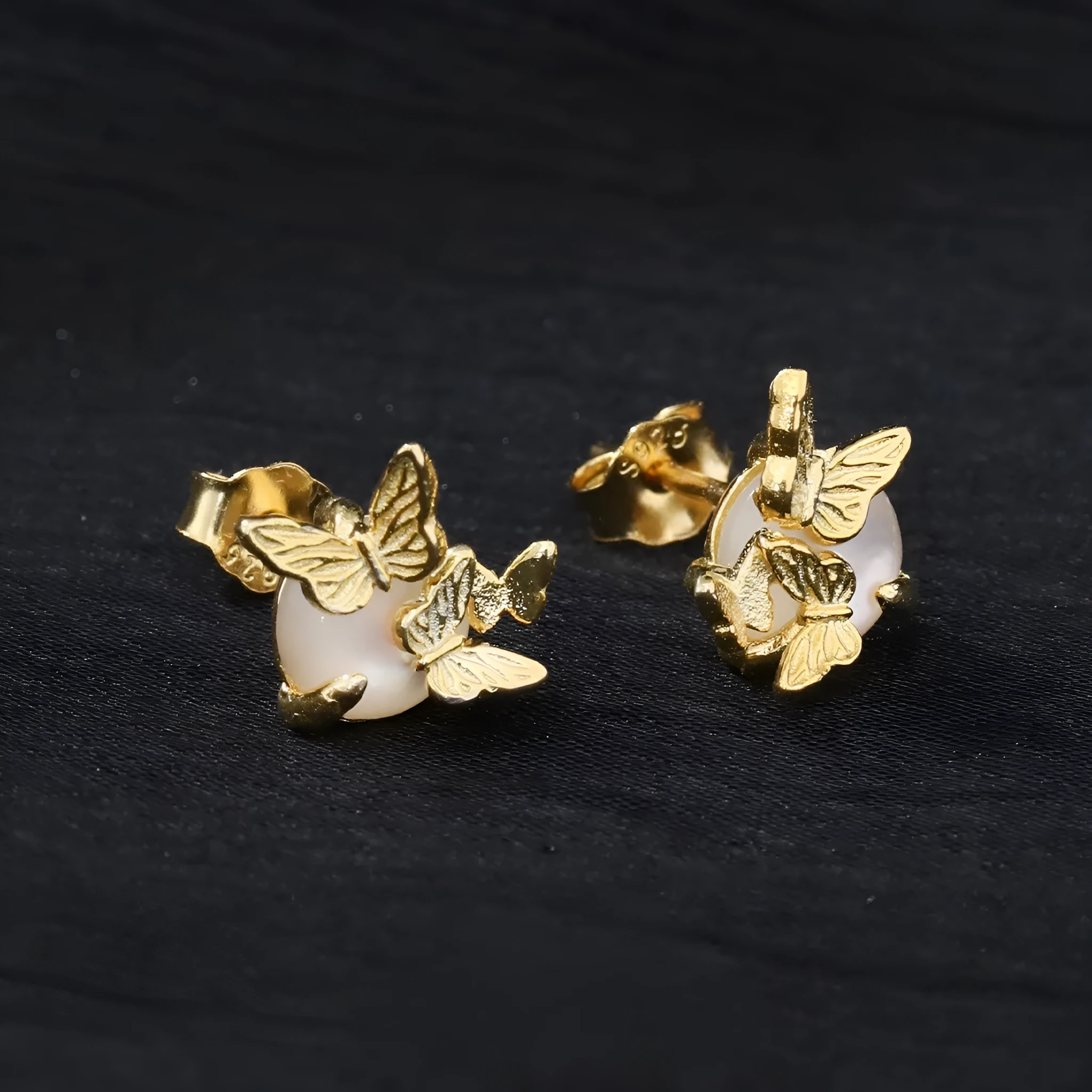 Butterfly design ear studs in 925 silver with electroplated gold or white gold finish