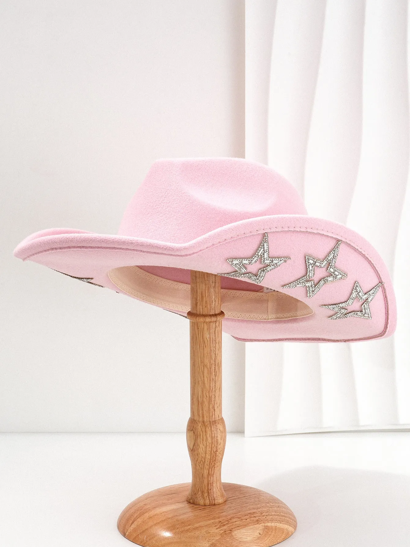 Polyester felt Western-style conical top hat with hexagonal star decoration in beige.