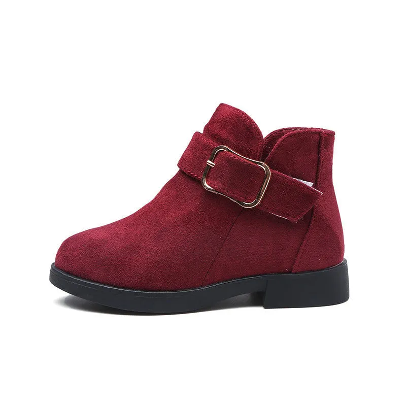 Big kids suede leather boots in black, side view, with rubber sole