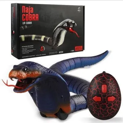Novelty Remote Control Snake in green colour, 38 cm plastic toy with retractable tongue on a wooden floor