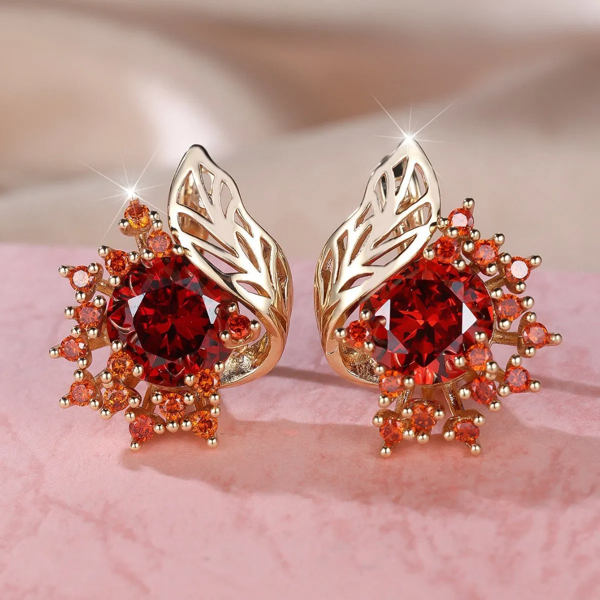 Round flowers feather design zircon earrings in champagne gold with coloured gemstone options.