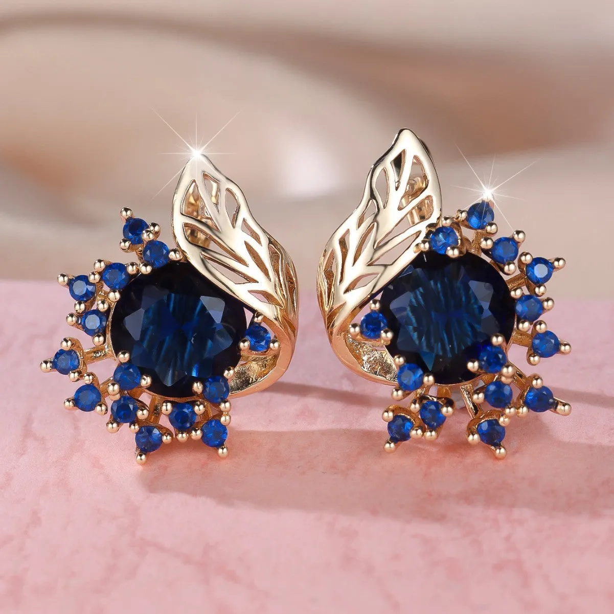 Round flowers feather design zircon earrings in champagne gold with coloured gemstone options.