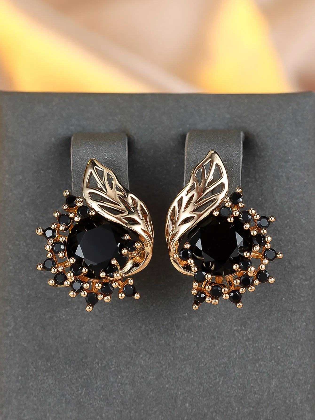 Round flowers feather design zircon earrings in champagne gold with coloured gemstone options.