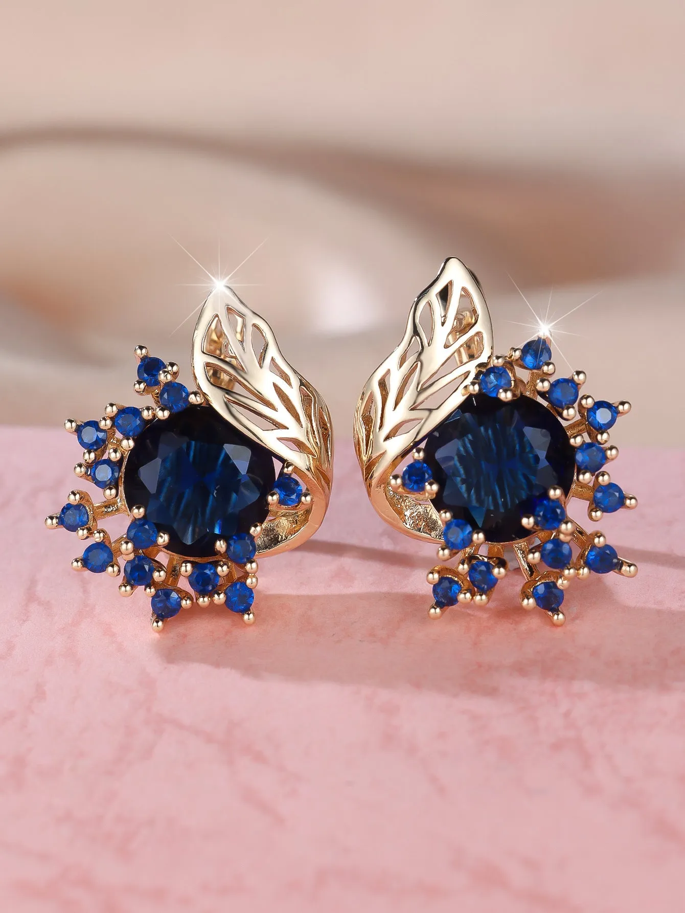 Round flowers feather design zircon earrings in champagne gold with coloured gemstone options.