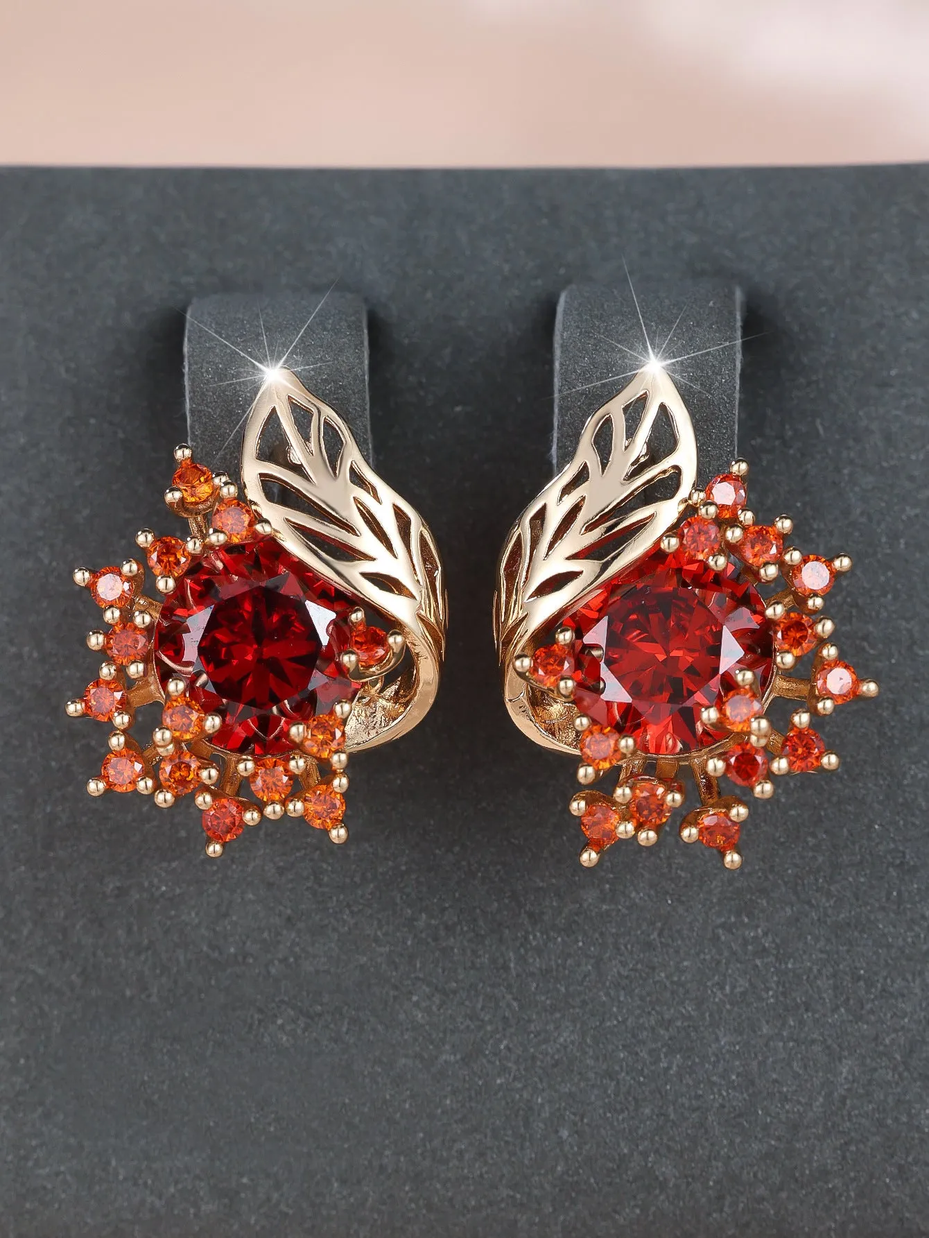 Round flowers feather design zircon earrings in champagne gold with coloured gemstone options.