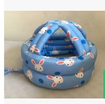 Baby anti collision hat with high-density sponge padding, adjustable headband, breathable cotton outer, colourful design