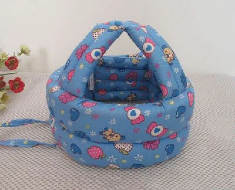 Baby anti collision hat with high-density sponge padding, adjustable headband, breathable cotton outer, colourful design