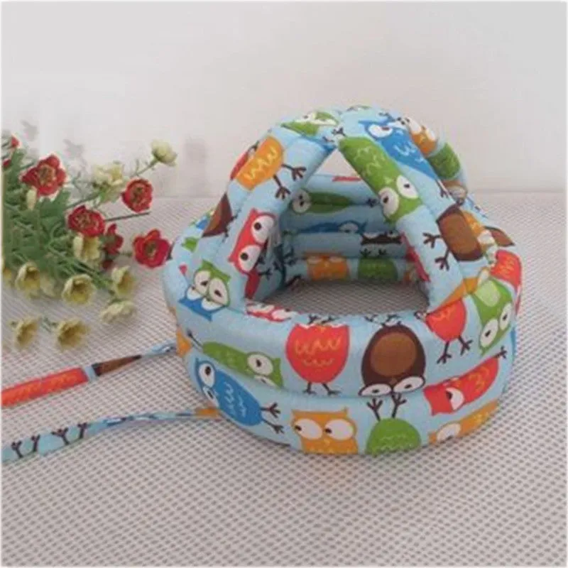Baby anti collision hat with high-density sponge padding, adjustable headband, breathable cotton outer, colourful design