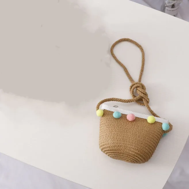 Children's straw hat and bag set in solid colour, large brim, dome top with cartoon pattern and hairy ball detail