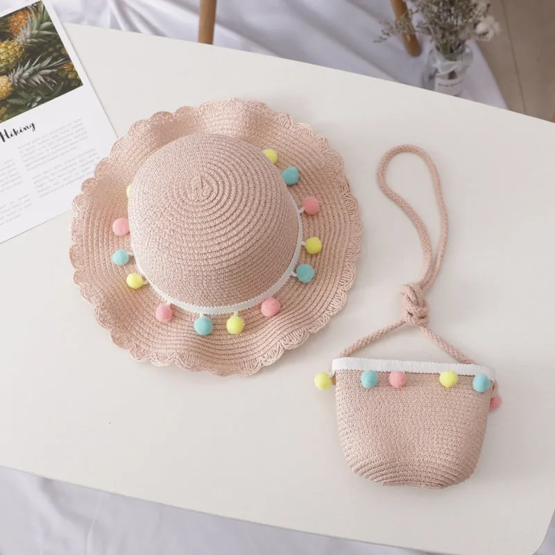 Children's straw hat and bag set in solid colour, large brim, dome top with cartoon pattern and hairy ball detail