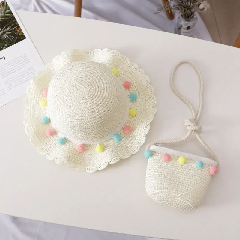 Children's straw hat and bag set in solid colour, large brim, dome top with cartoon pattern and hairy ball detail
