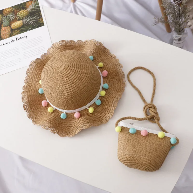 Children's straw hat and bag set in solid colour, large brim, dome top with cartoon pattern and hairy ball detail