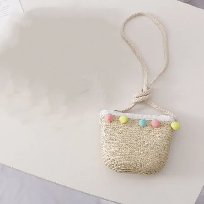 Children's straw hat and bag set in solid colour, large brim, dome top with cartoon pattern and hairy ball detail