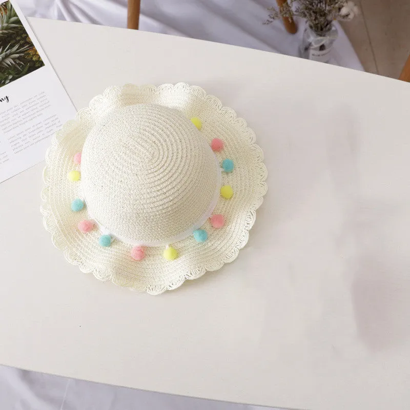 Children's straw hat and bag set in solid colour, large brim, dome top with cartoon pattern and hairy ball detail