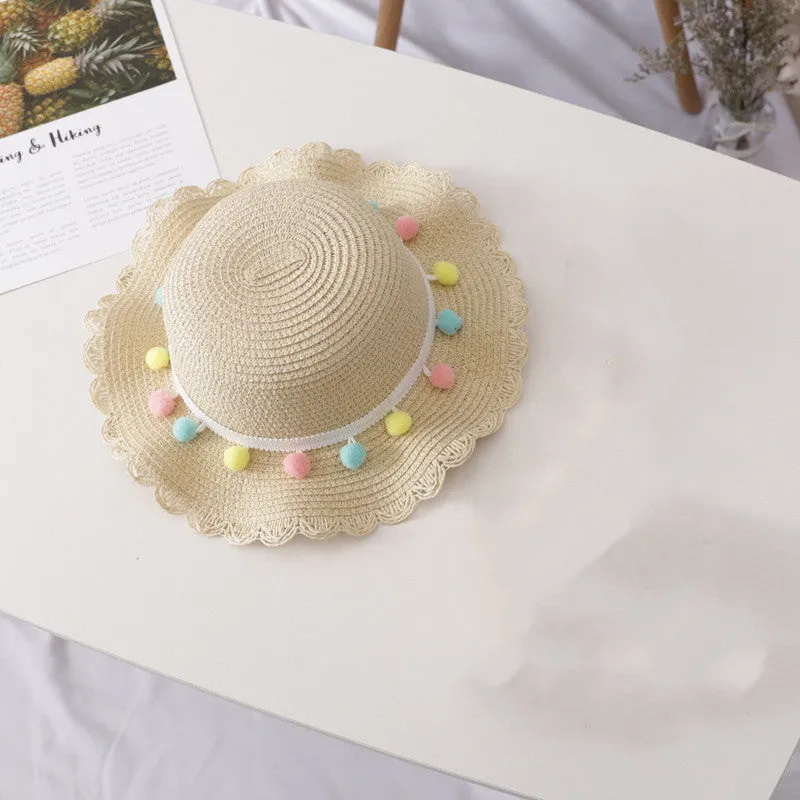 Children's straw hat and bag set in solid colour, large brim, dome top with cartoon pattern and hairy ball detail