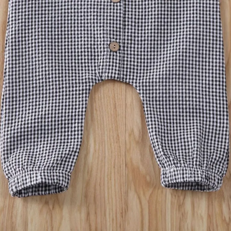 Black baby romper with lid buckle closure and sleeveless cotton design for newborns