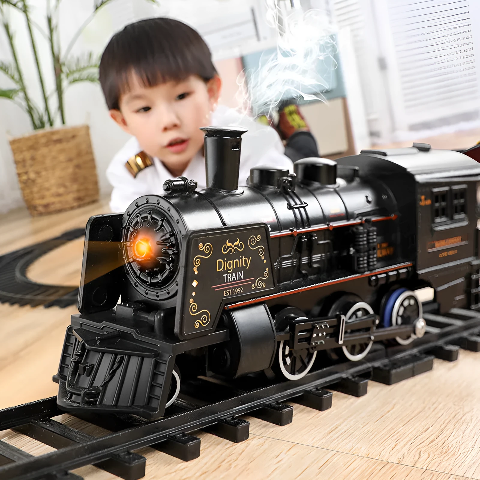 Simulation orbit classical model toy with black base, 3 carriages, and accessories on a flat surface