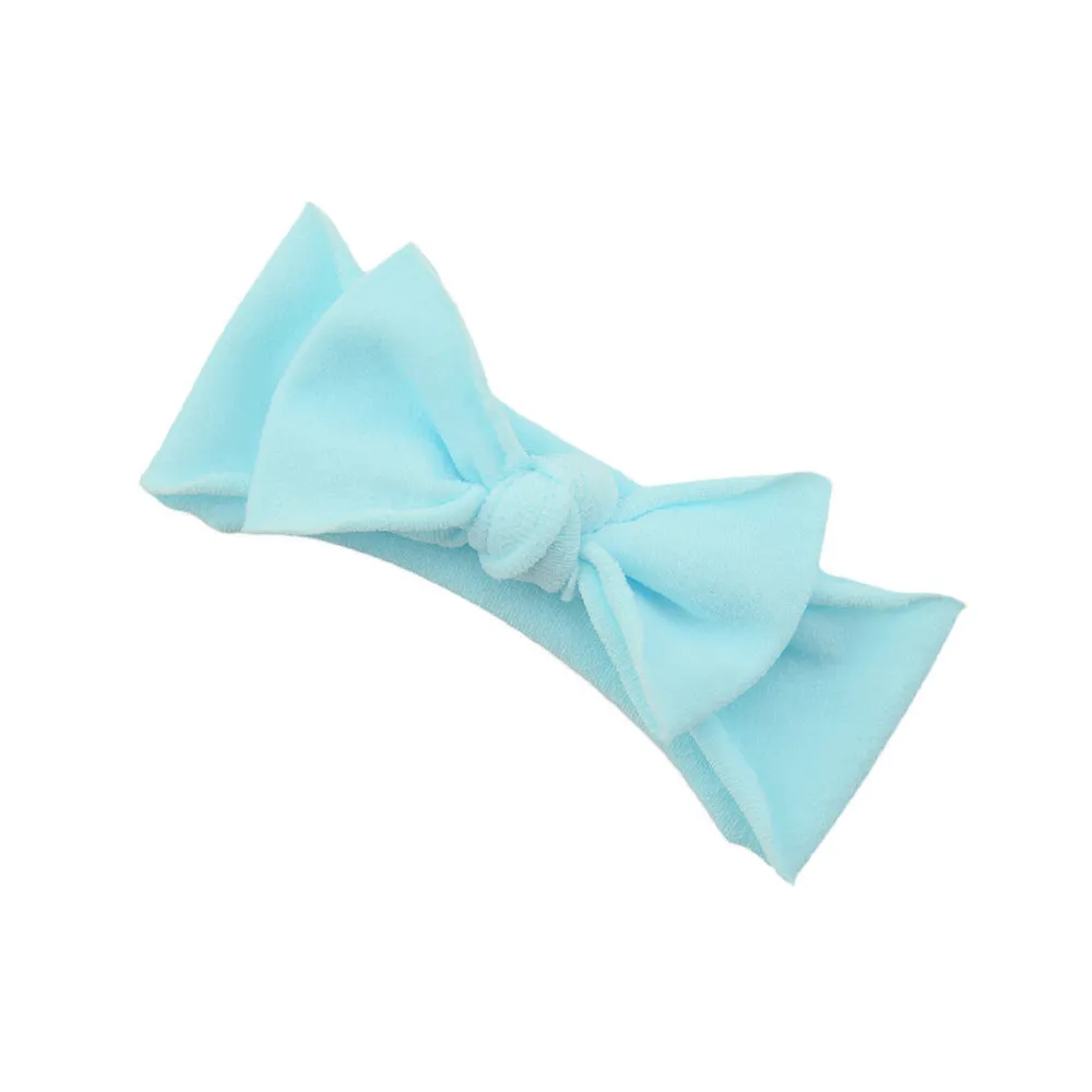 Solid colour knotted cloth headband for baby girls with bowknot design, available in 37 colours