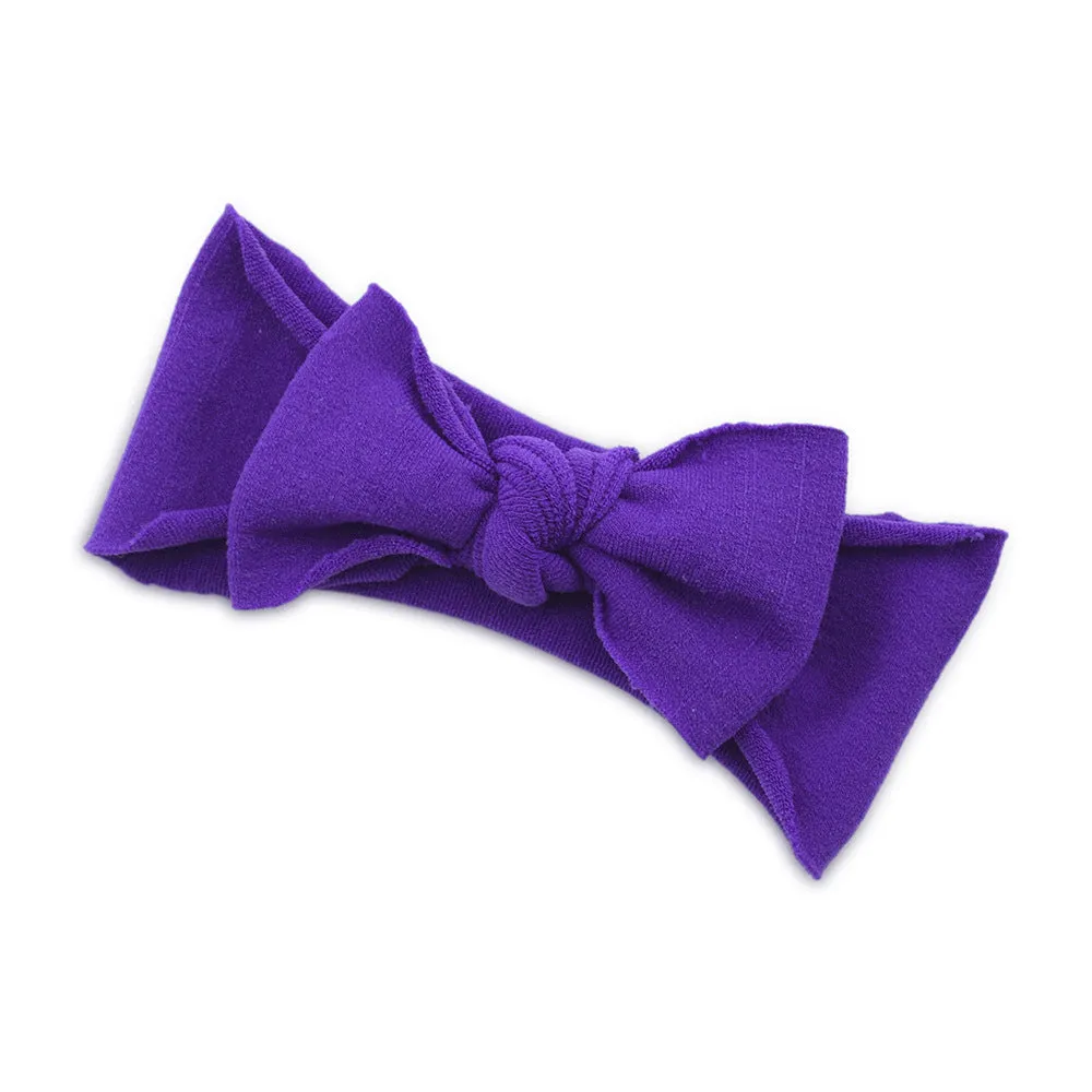 Solid colour knotted cloth headband for baby girls with bowknot design, available in 37 colours