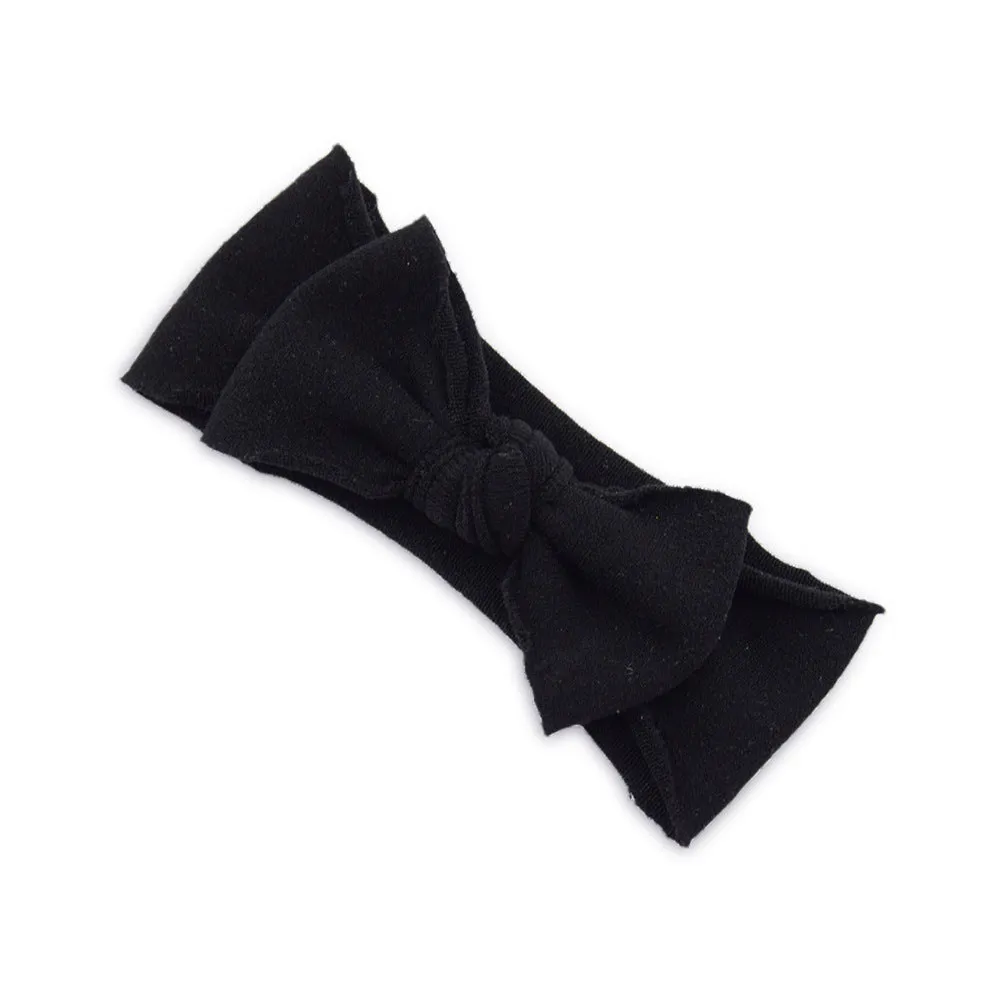 Solid colour knotted cloth headband for baby girls with bowknot design, available in 37 colours