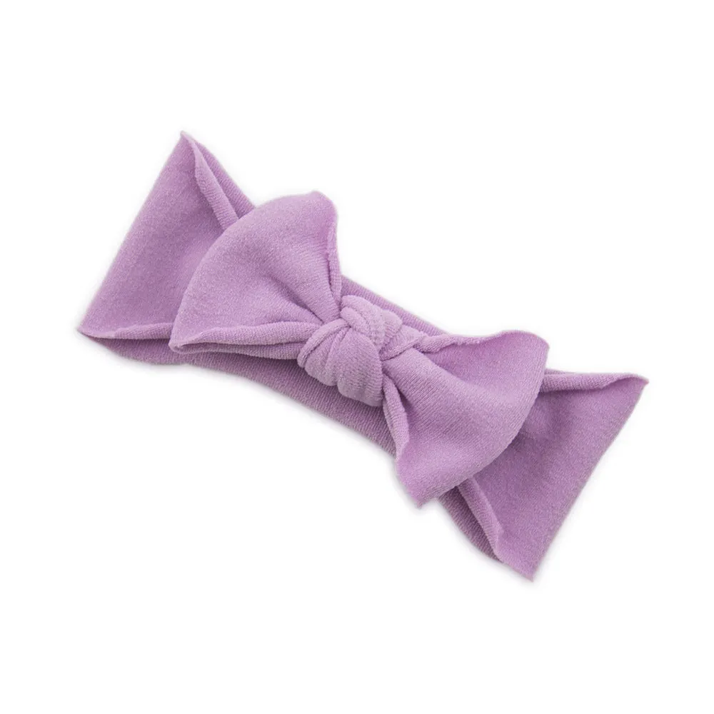 Solid colour knotted cloth headband for baby girls with bowknot design, available in 37 colours