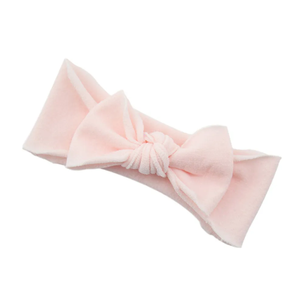 Solid colour knotted cloth headband for baby girls with bowknot design, available in 37 colours