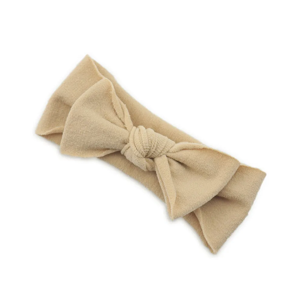 Solid colour knotted cloth headband for baby girls with bowknot design, available in 37 colours