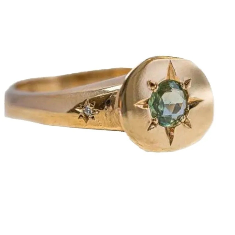 Gold-colour adjustable ring with a micro-inlaid oval star design on a zinc alloy band.