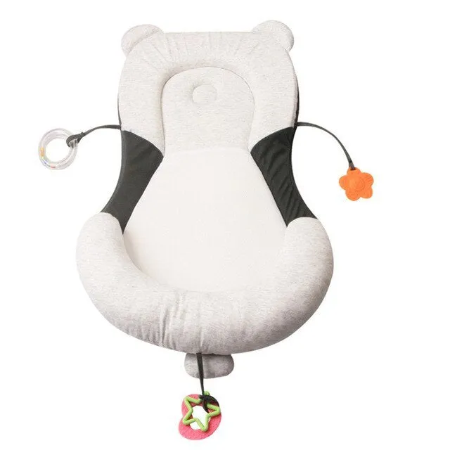 Baby positioning pad in grey colour with sleeping pad shape and polyester fiber filling