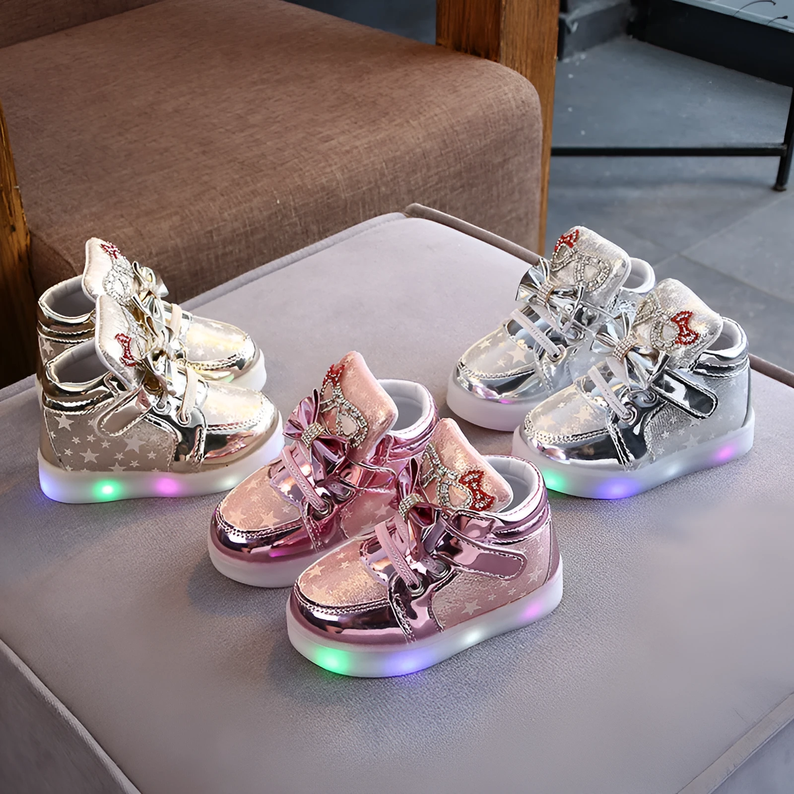 Girls stars printed LED light-up shoes with rhinestones on a white background, artificial leather upper, casual design