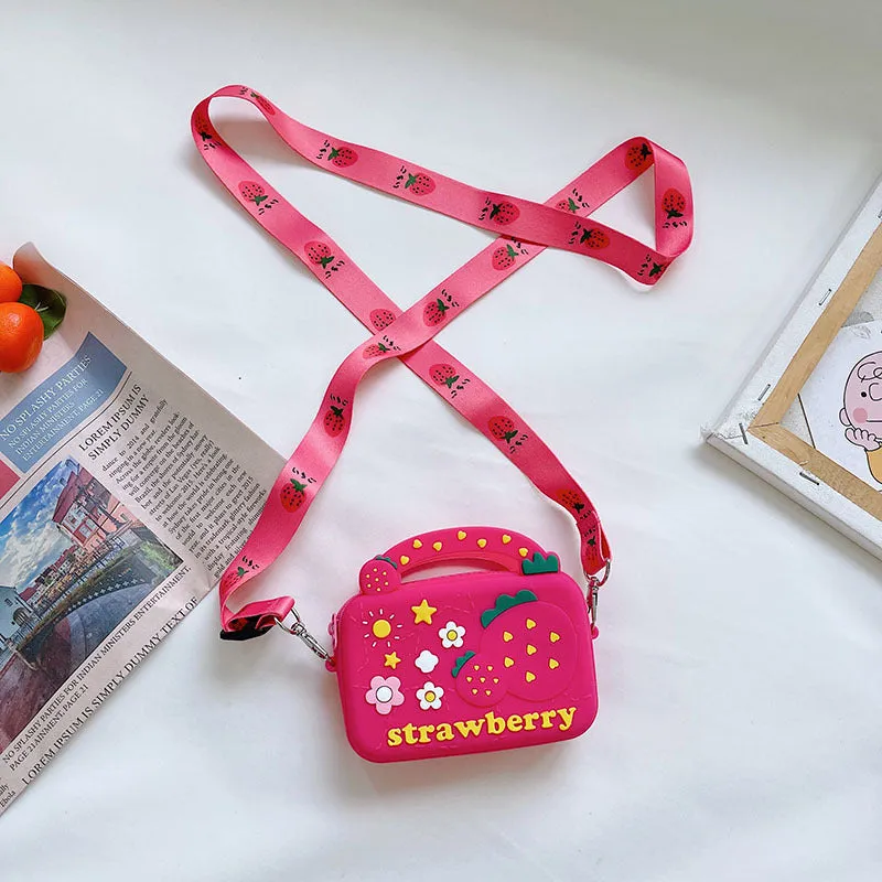 Silicone children's coin purse in round yellow with cartoon donut pattern and crossbody strap