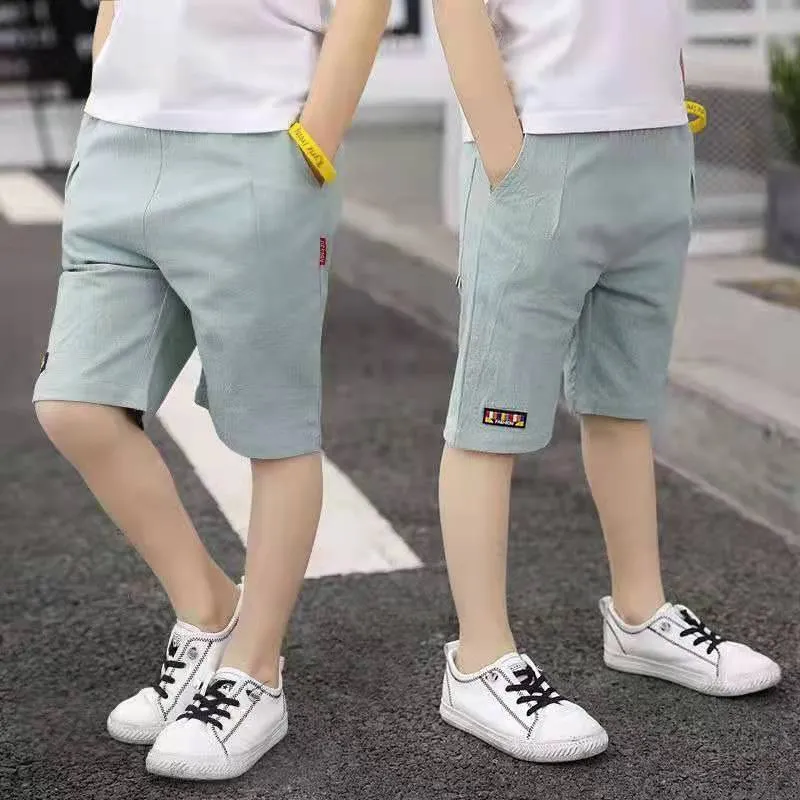 Summer boys cotton shorts with tether fly and cropped length in five colours black cyan green khaki yellow