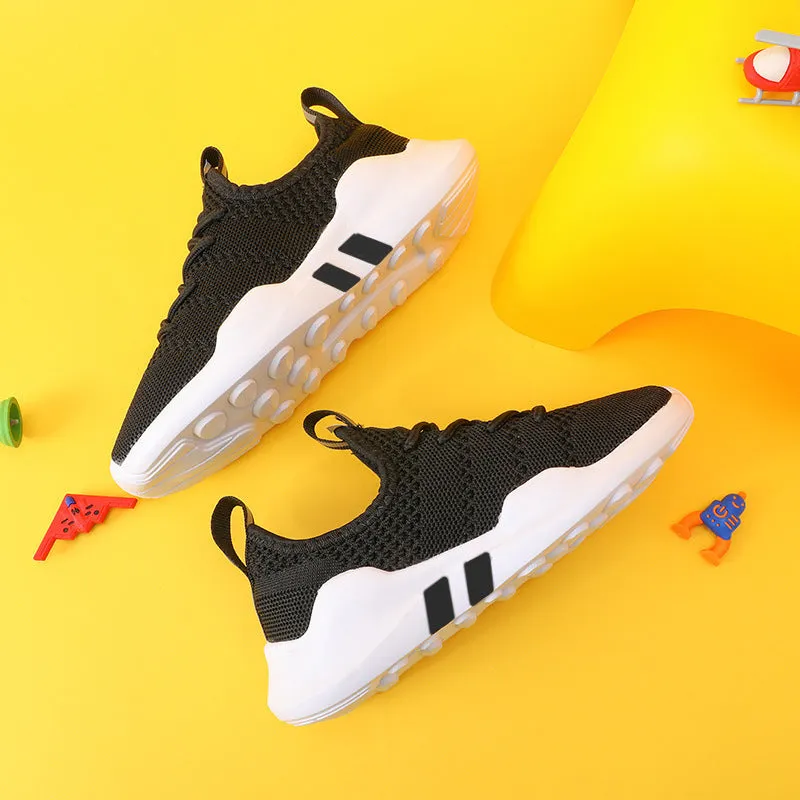 Breathable fly woven children's sports shoe in black with mesh upper and MD sole, side view