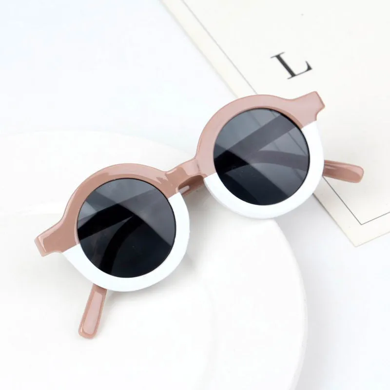 Children's round retro sunglasses with leopard print patchwork and PC frame in pink and leopard colourway
