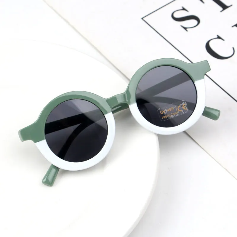 Children's round retro sunglasses with leopard print patchwork and PC frame in pink and leopard colourway