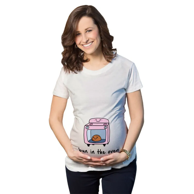 White cotton maternity t-shirt with hand print pattern, round collar, short sleeves on model