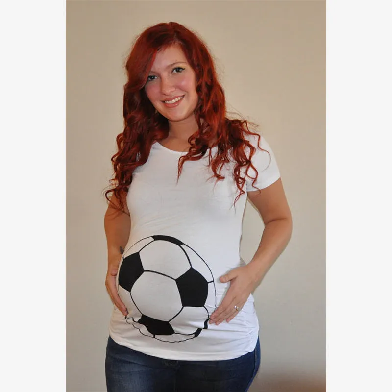 White cotton maternity t-shirt with hand print pattern, round collar, short sleeves on model